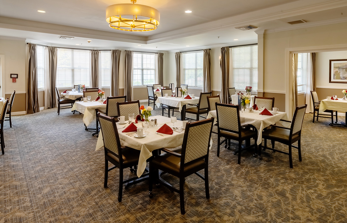 A dining room set for dinner.