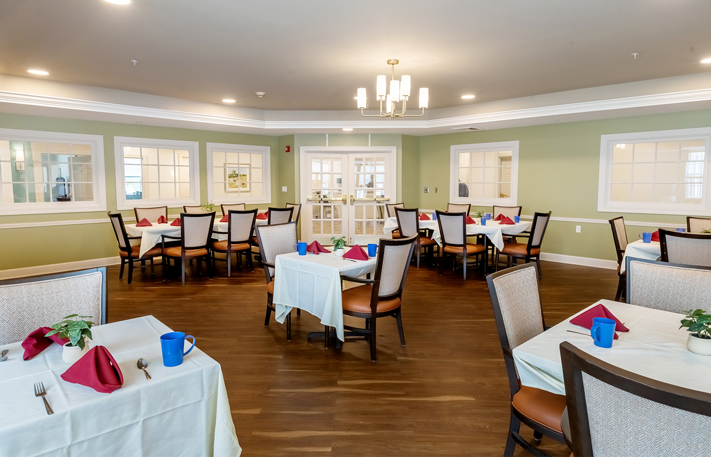 A dining room set for dinner.