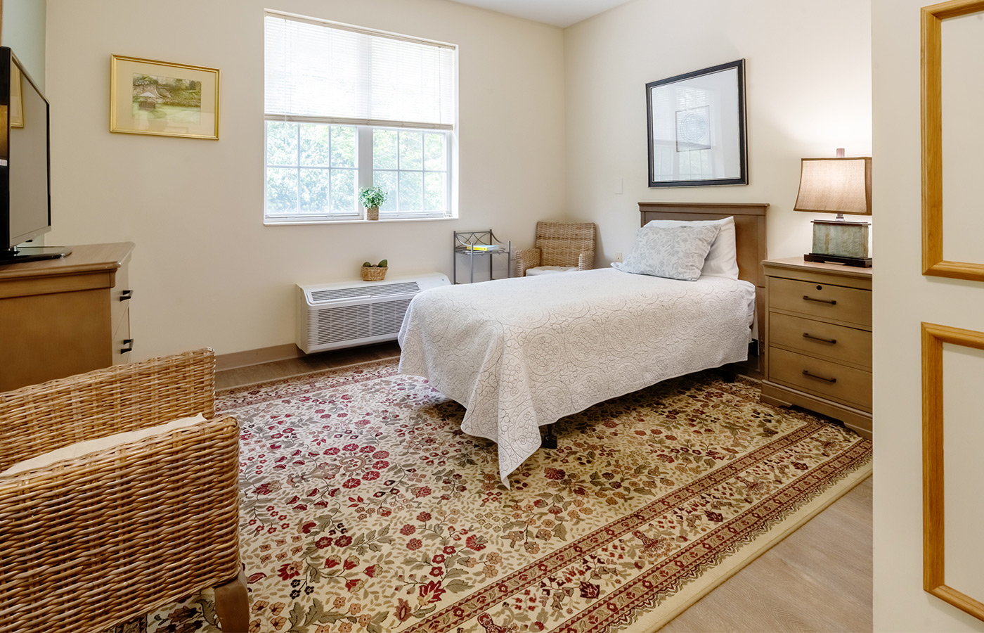 A fully furnished apartment bedroom.