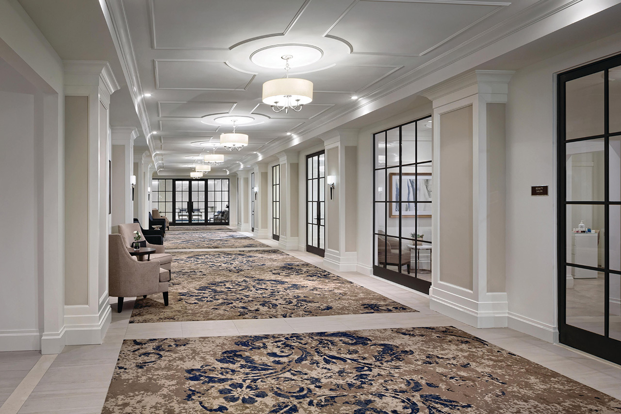 The Watermark at Brooklyn Heights hallway with carpet and doors.