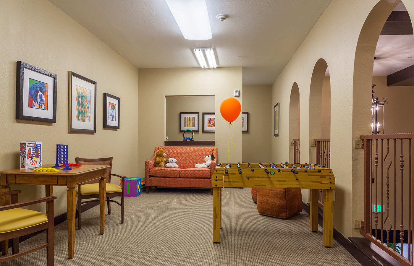 Various games and seating in common area.