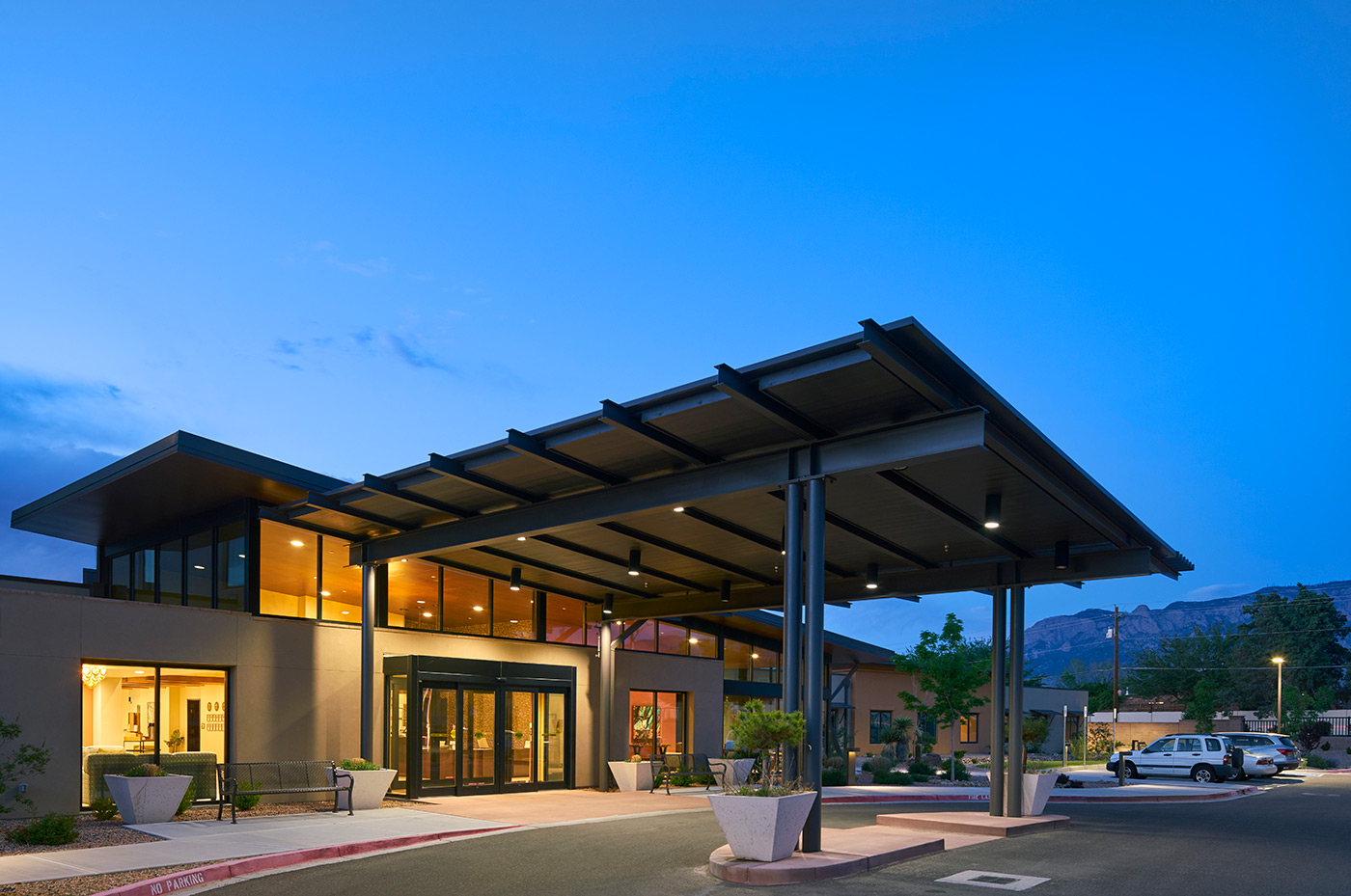 The Watermark at Cherry Hills building exterior at night time.