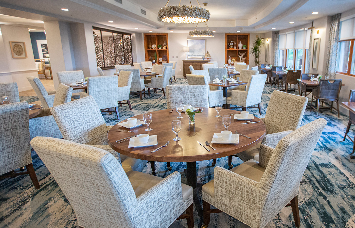 A dining room set for dinner.