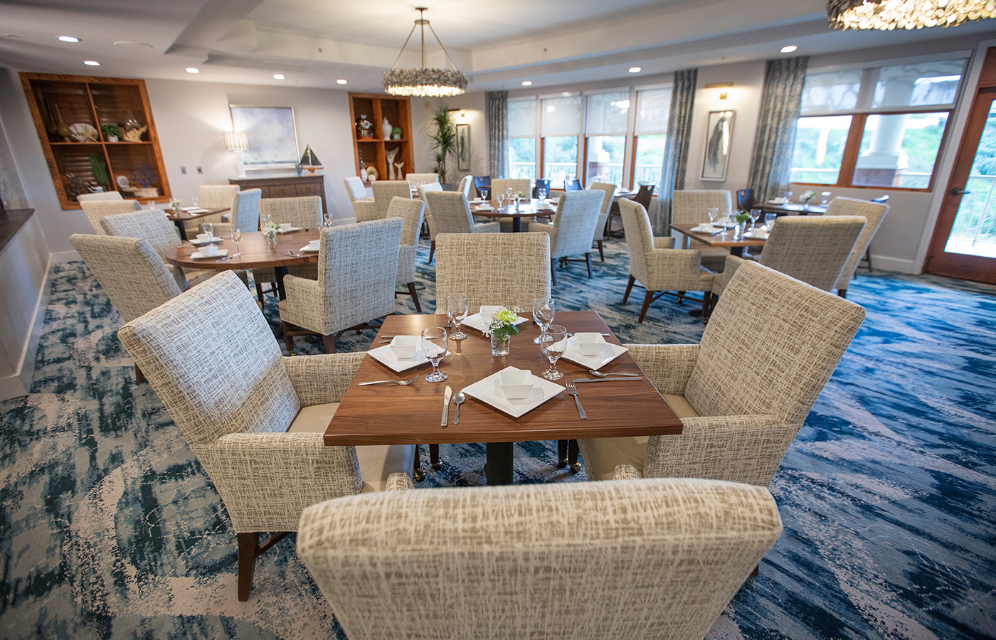 A dining room set for dinner.