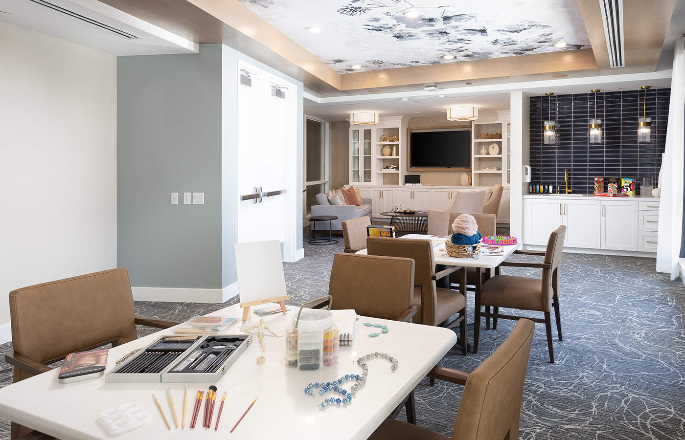 An activity room with stuff to do on the tables.