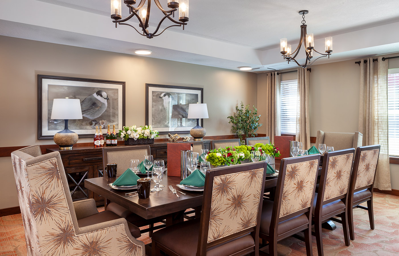 Dining table with chairs and lamps.