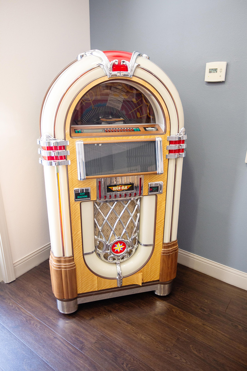 Jukebox in corner.