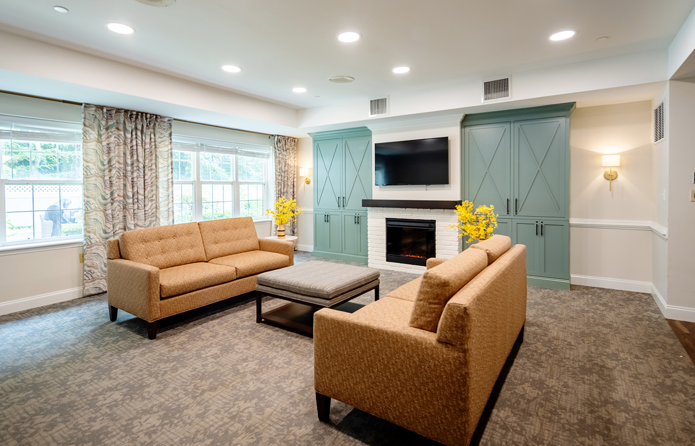 A common living room area with a fireplace.