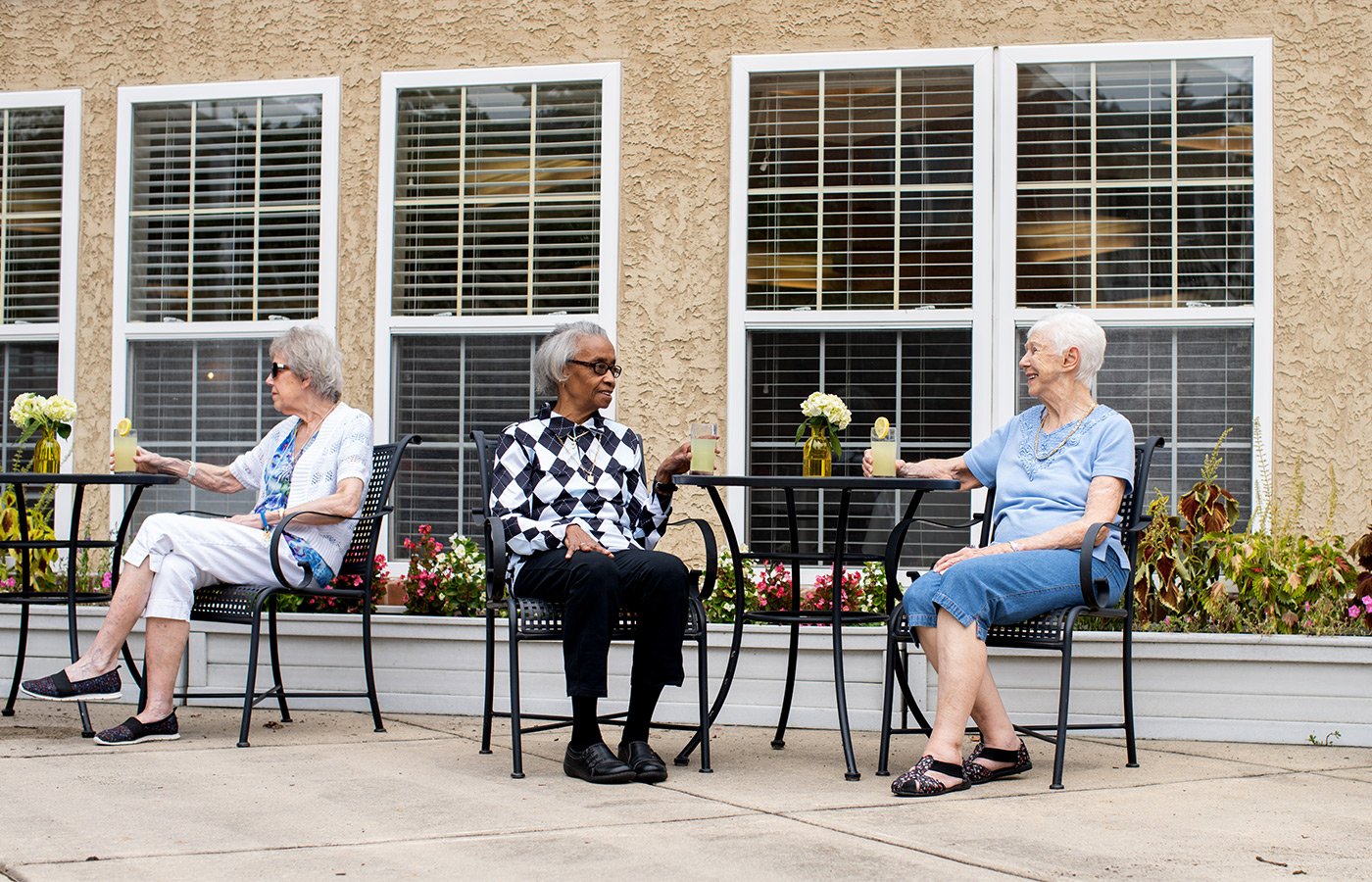 People having drinks on the patio.