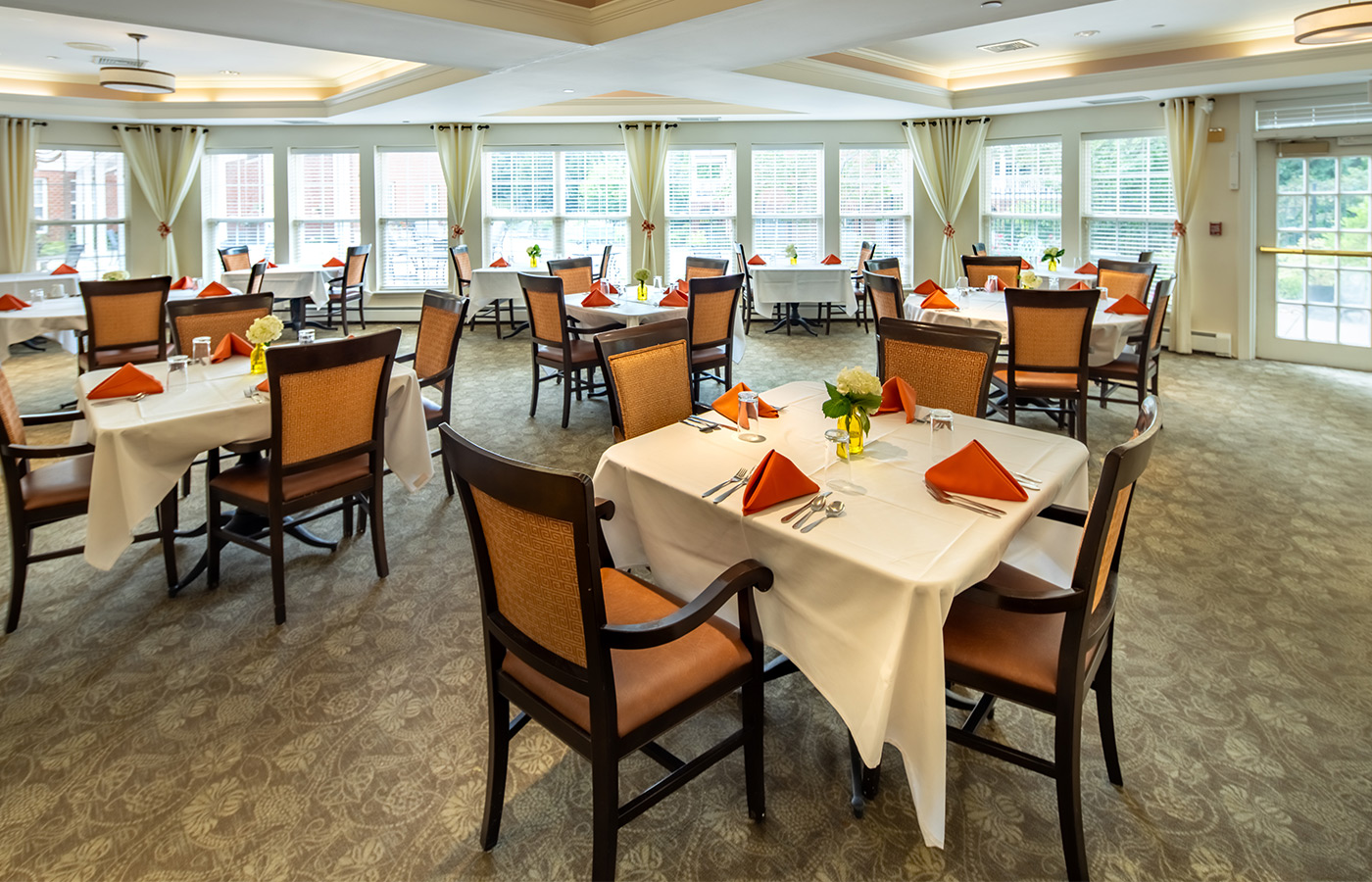 A dining room set for dinner.