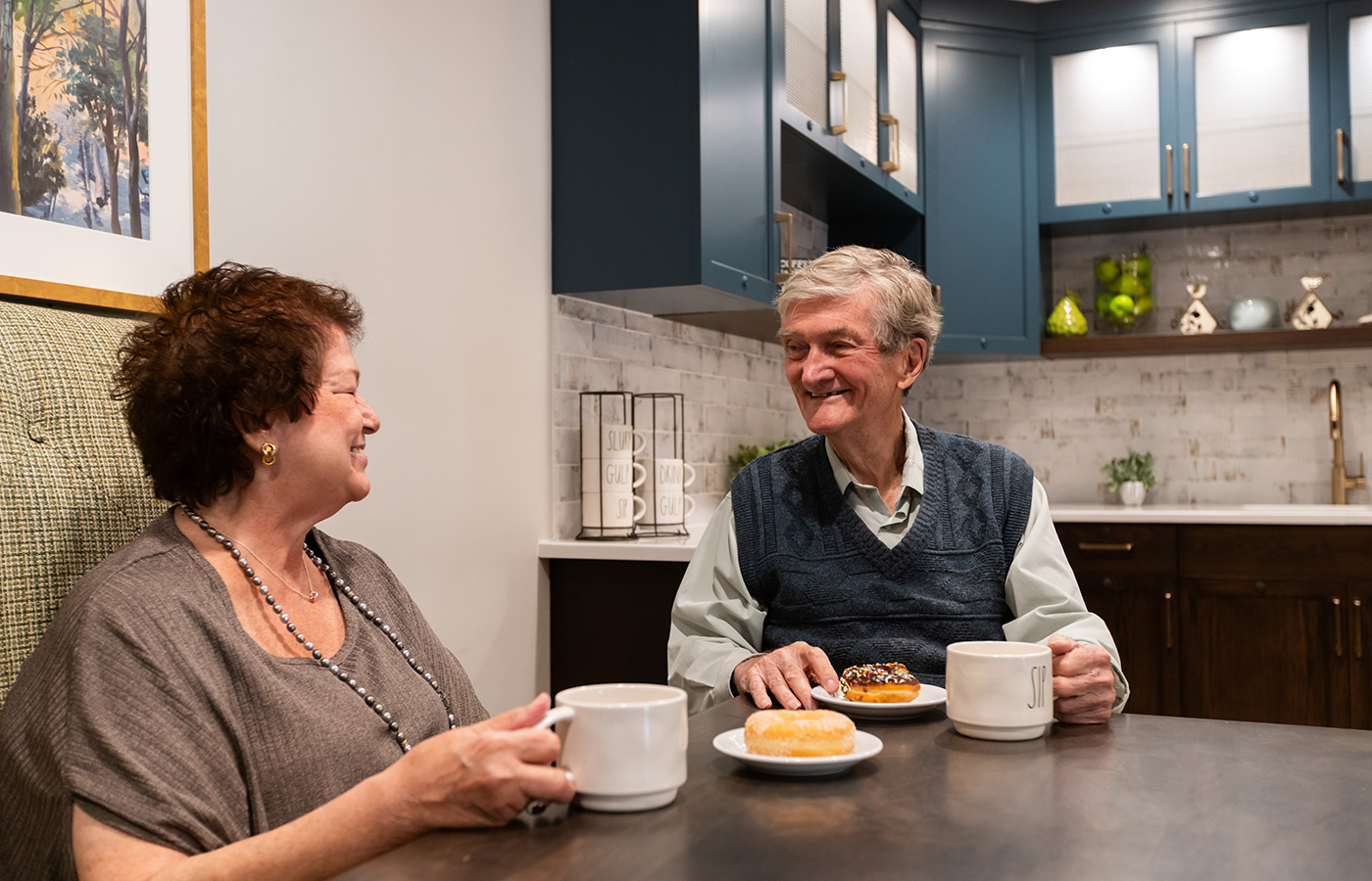 Two people having coffee together.