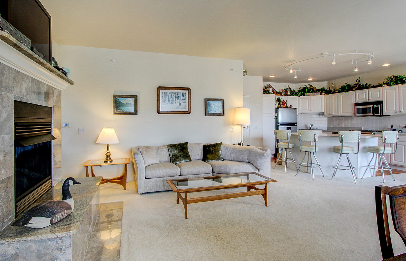 A large open living room and kitchen space.