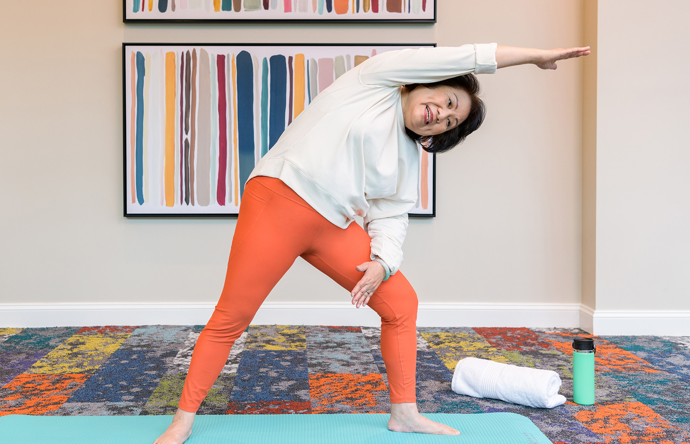 A resident is practicing yoga.