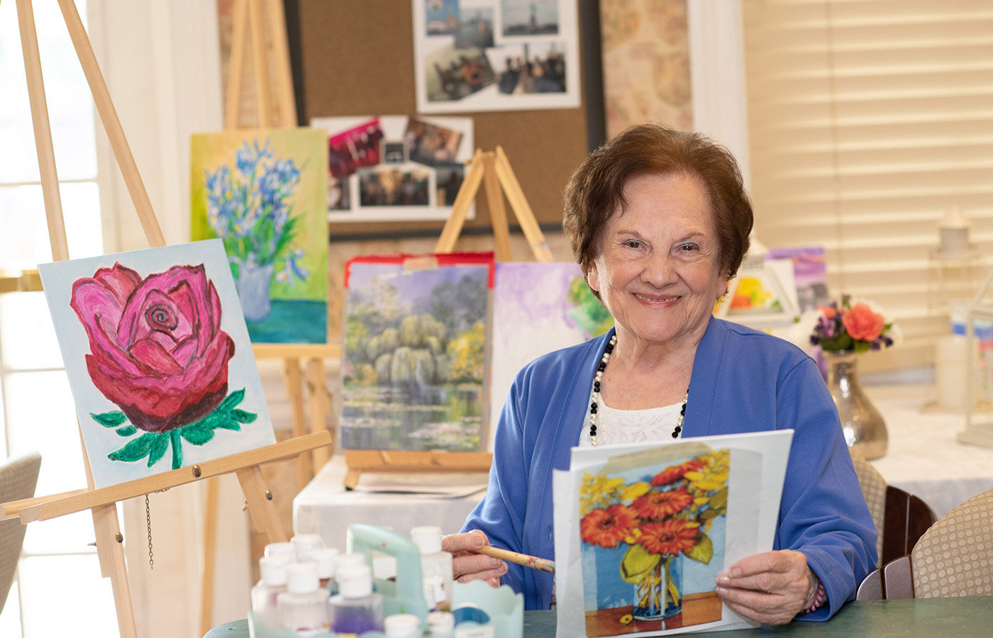 A resident enjoying an art class.