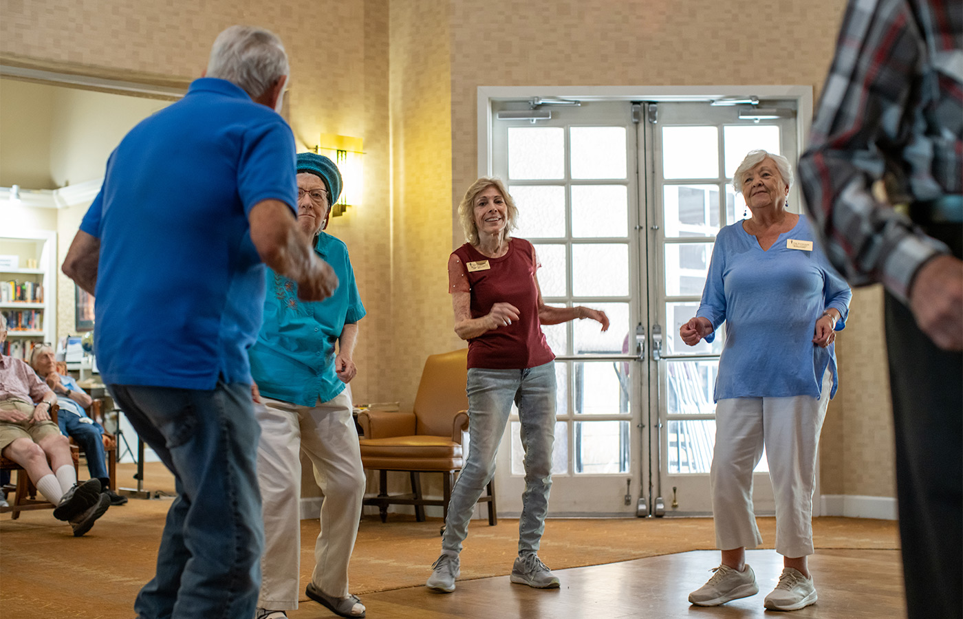 People dancing at happy hour.