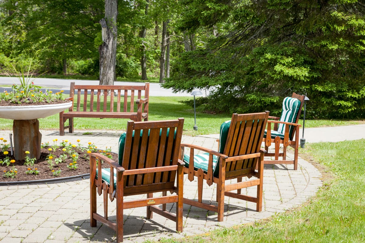 Chairs in a circle outside in the courtyard.