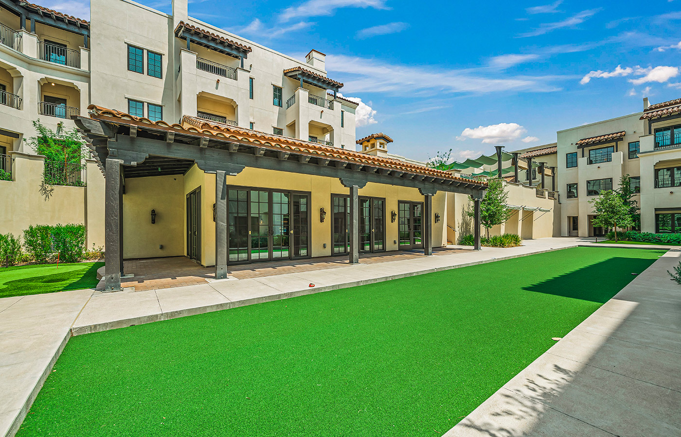 The Hacienda at the Canyon exterior building with golf field.