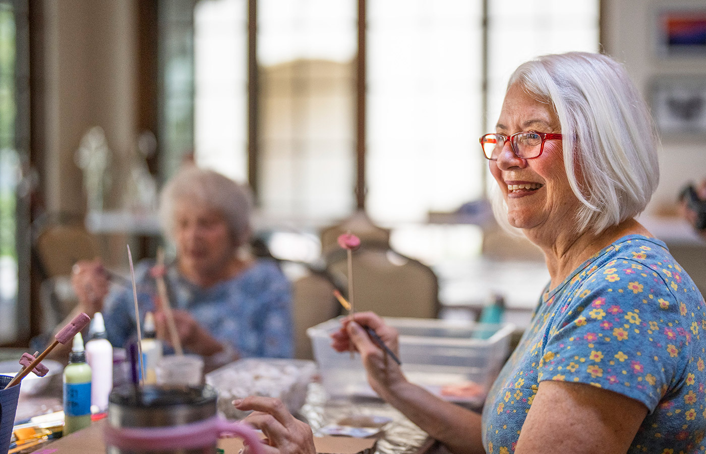 Residents enjoying an art class.