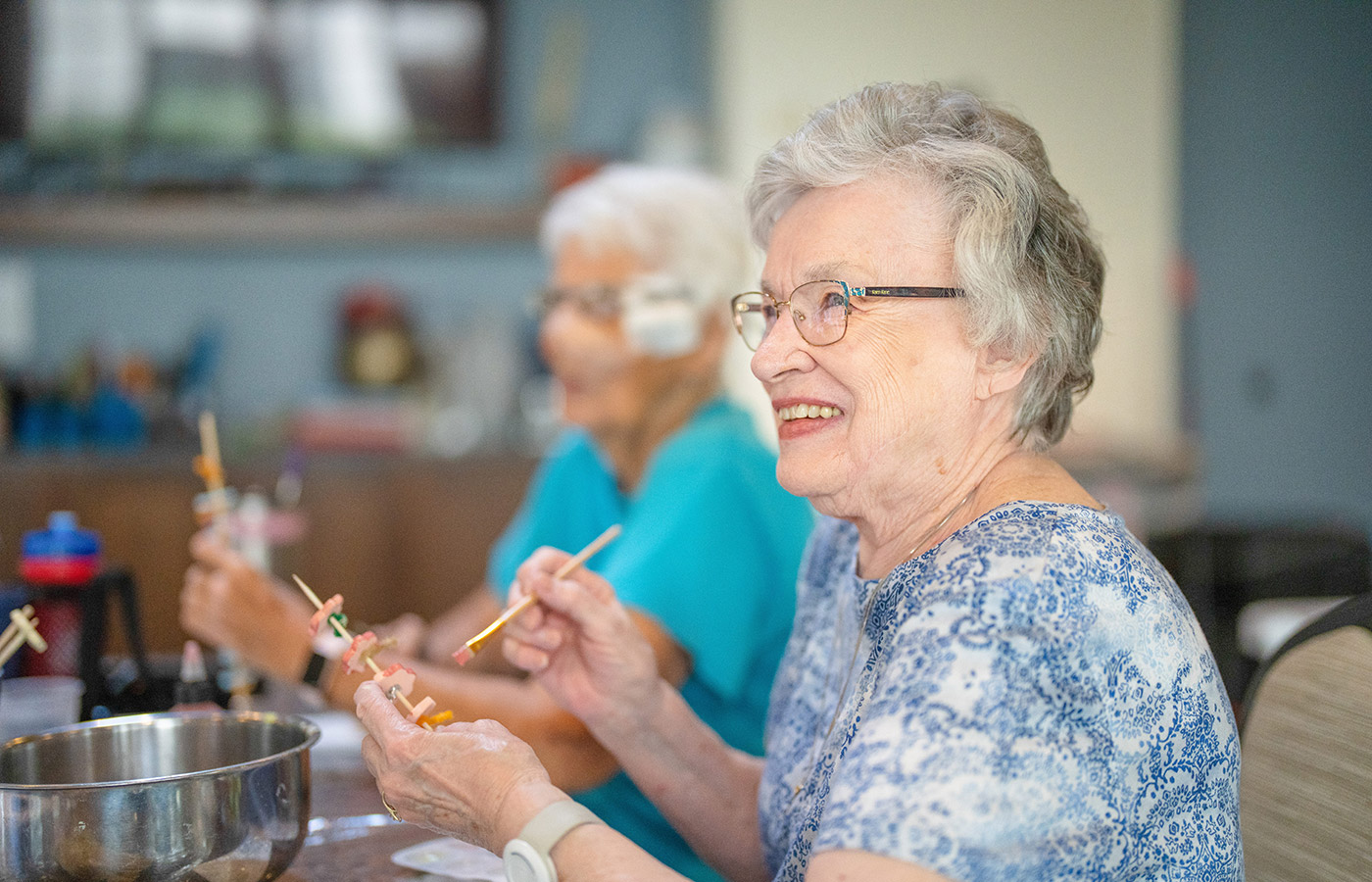 Residents enjoying an art class.