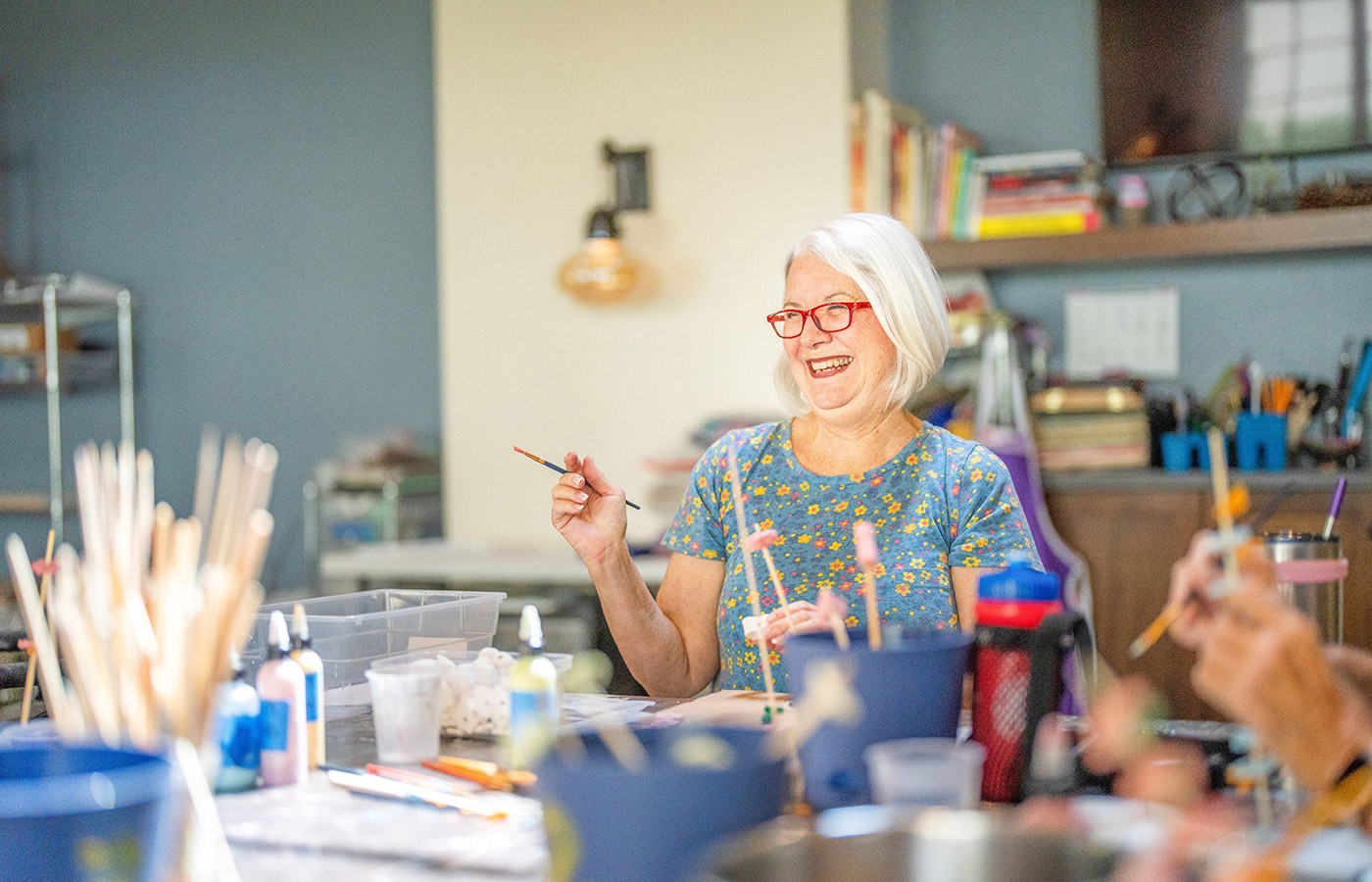 Residents enjoying an art class.