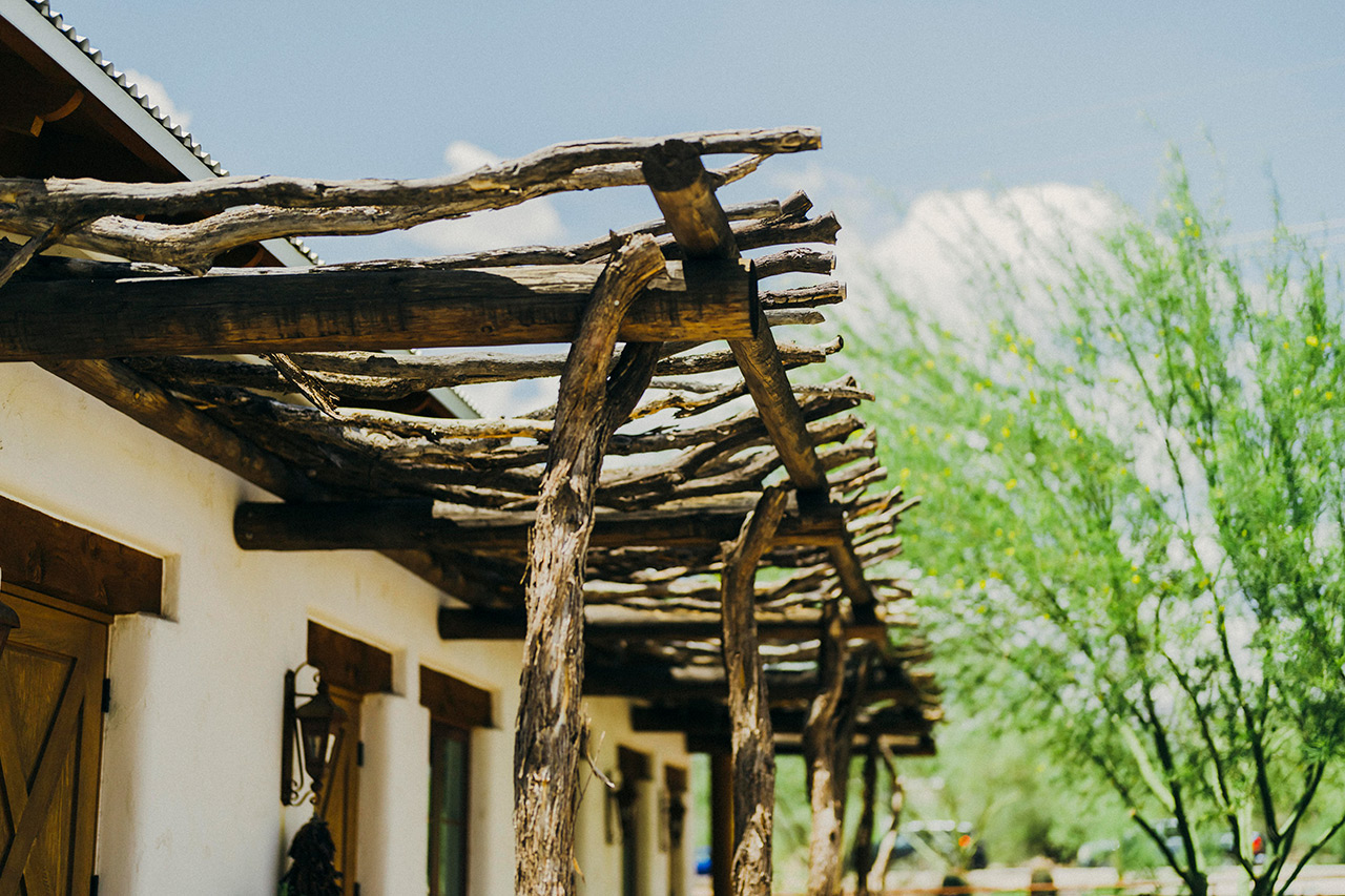 The Hacienda at the River exterior building and courtyard. 