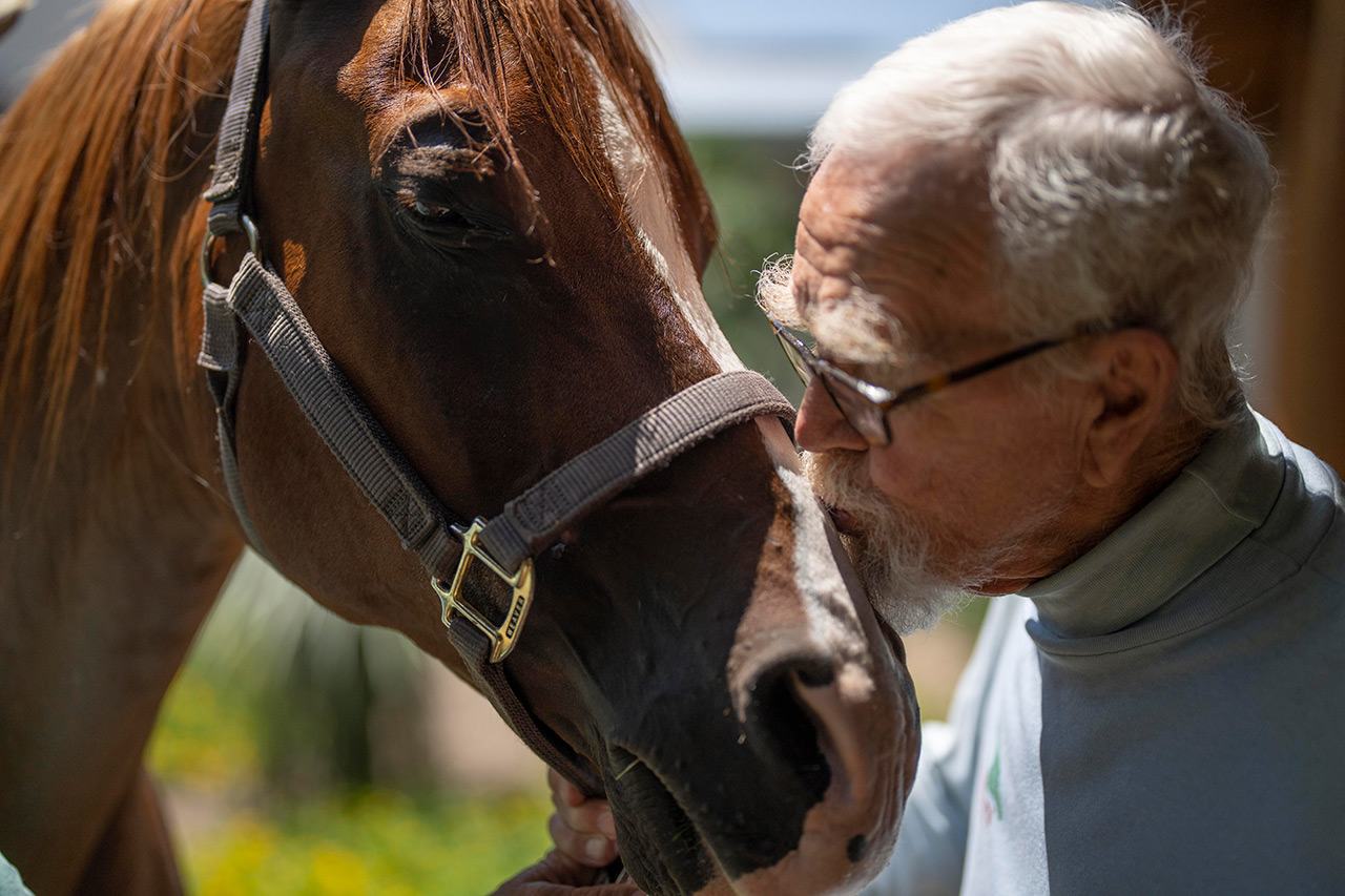 Resident with a horse.