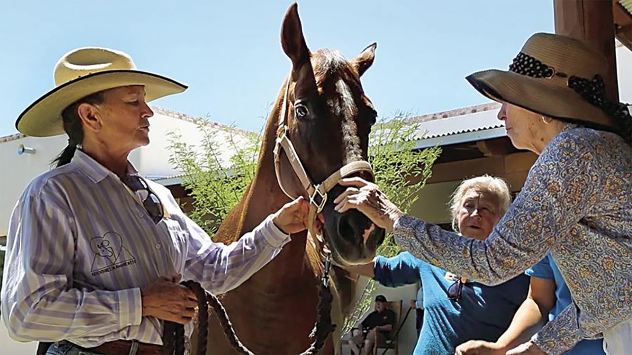 Residents with a horse.