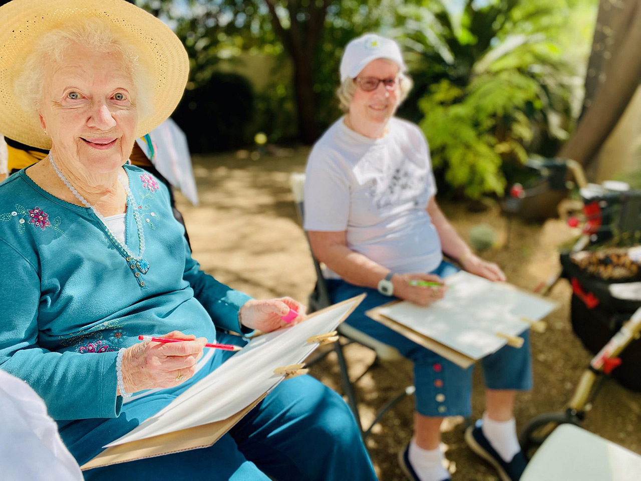 Residents enjoying an art class.