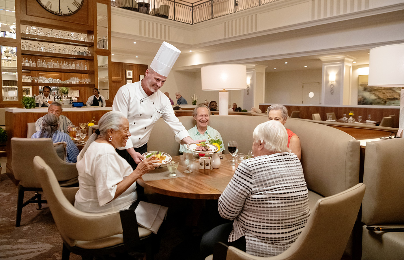 Residents enjoying lunch with the chef.