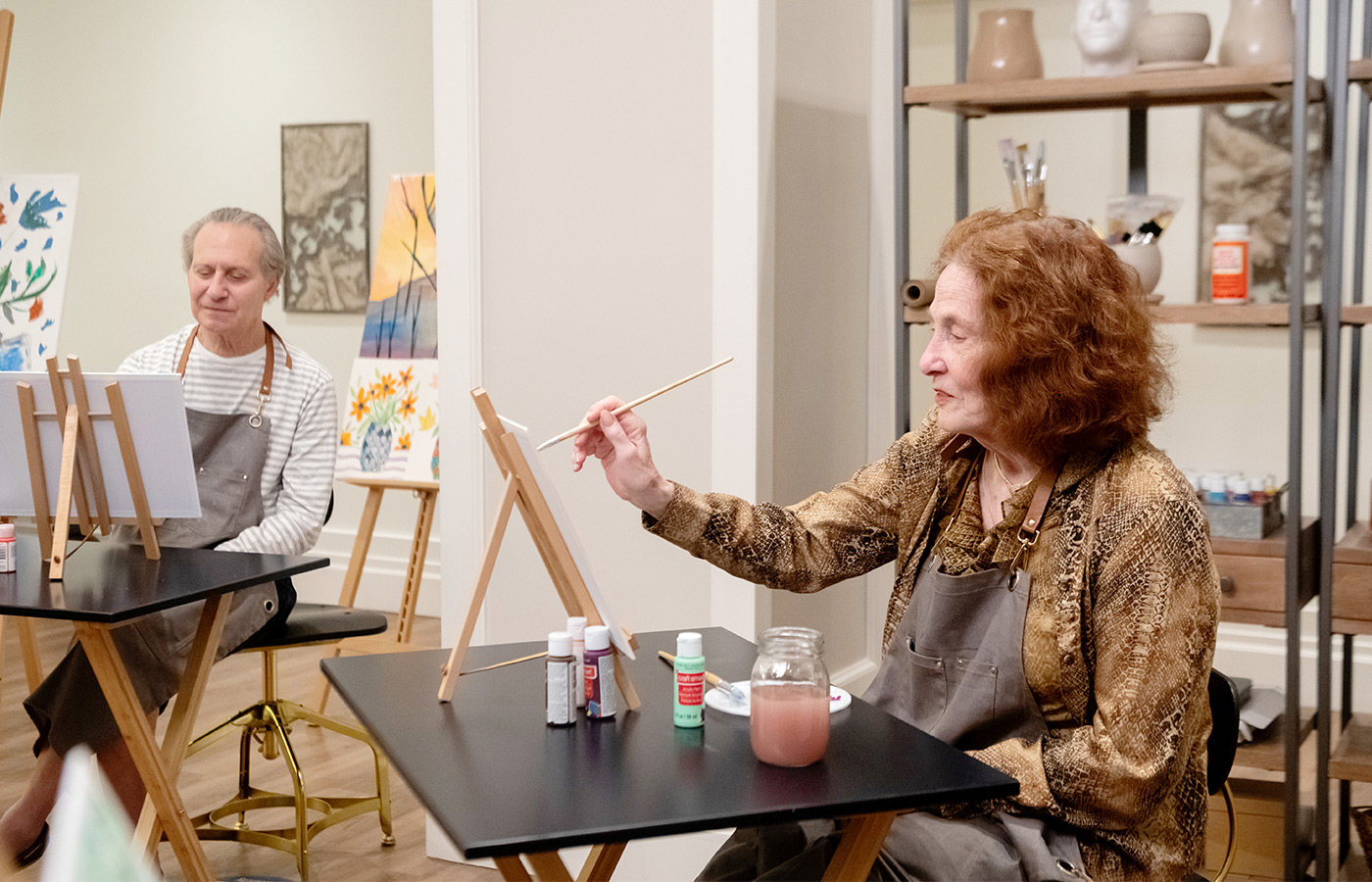 Residents enjoying an art class.