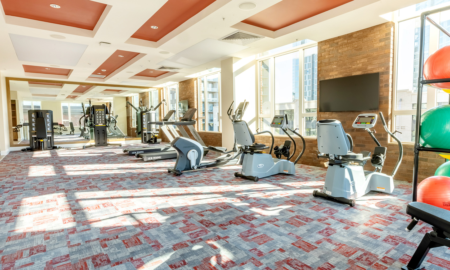 The fitness center with exercise equipment.