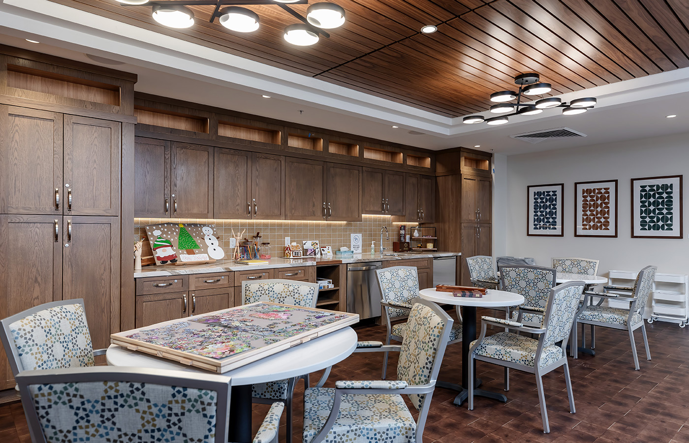 An activity room with games on the tables.