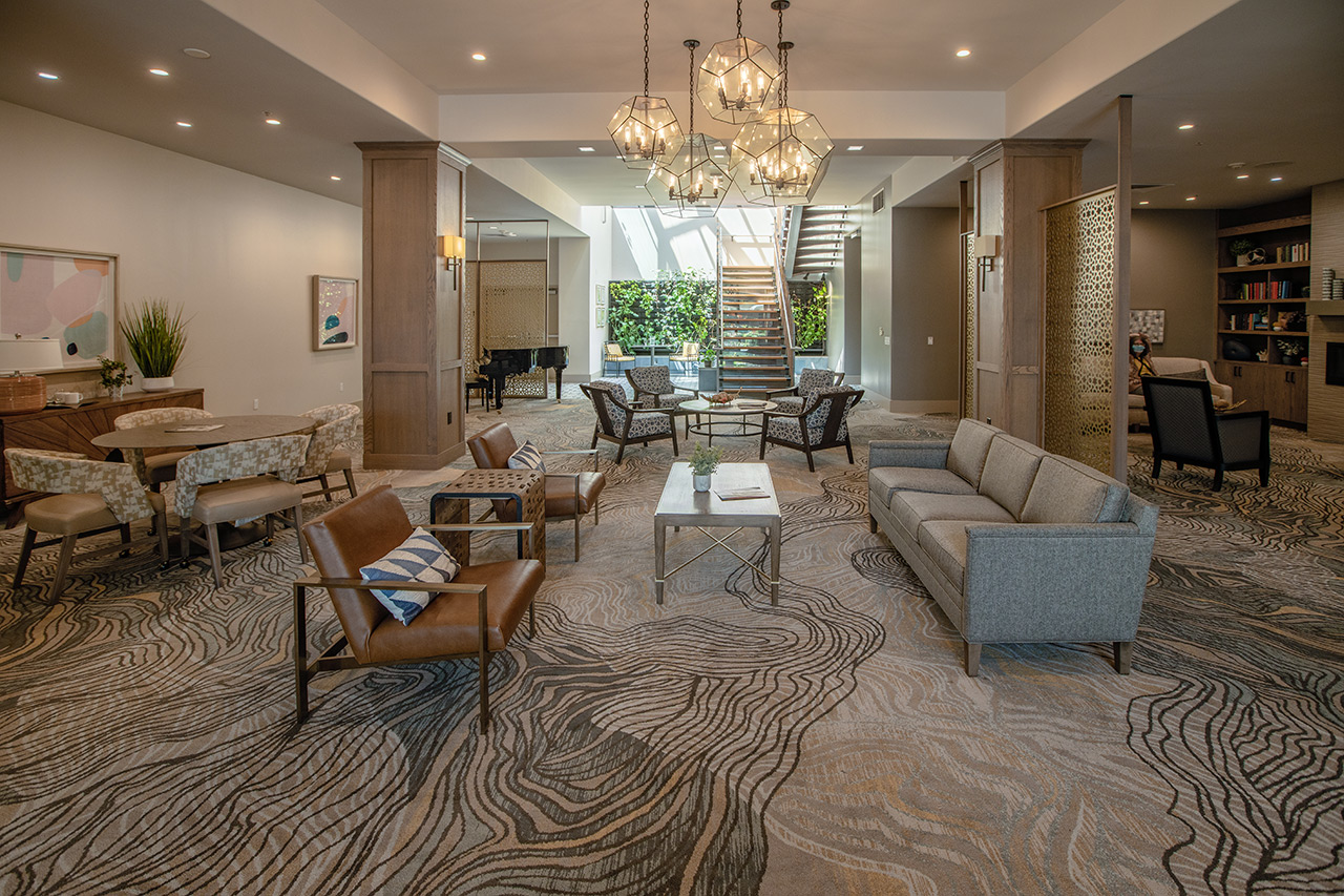 The Watermark By The Bay lobby with seating area.