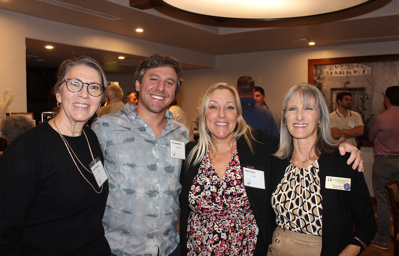 A group of people smiling.