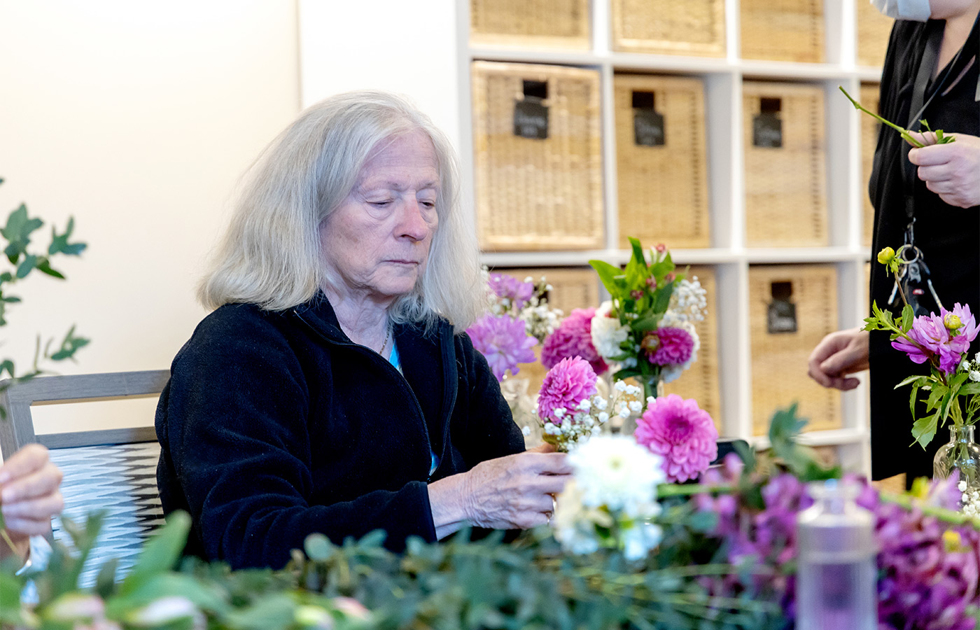 A person arranging flowers.