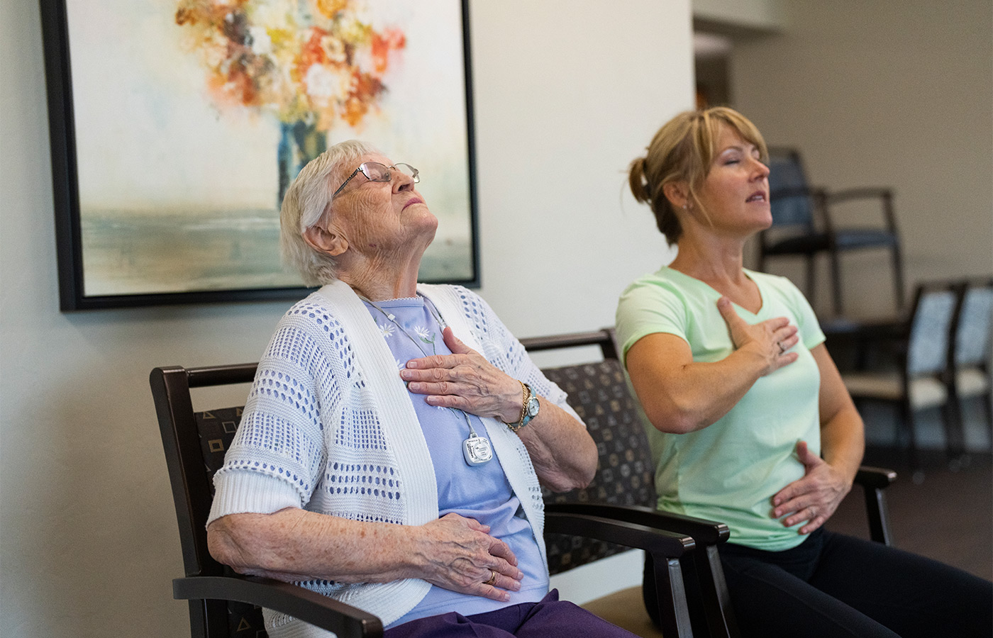 People doing breathing exercises. 