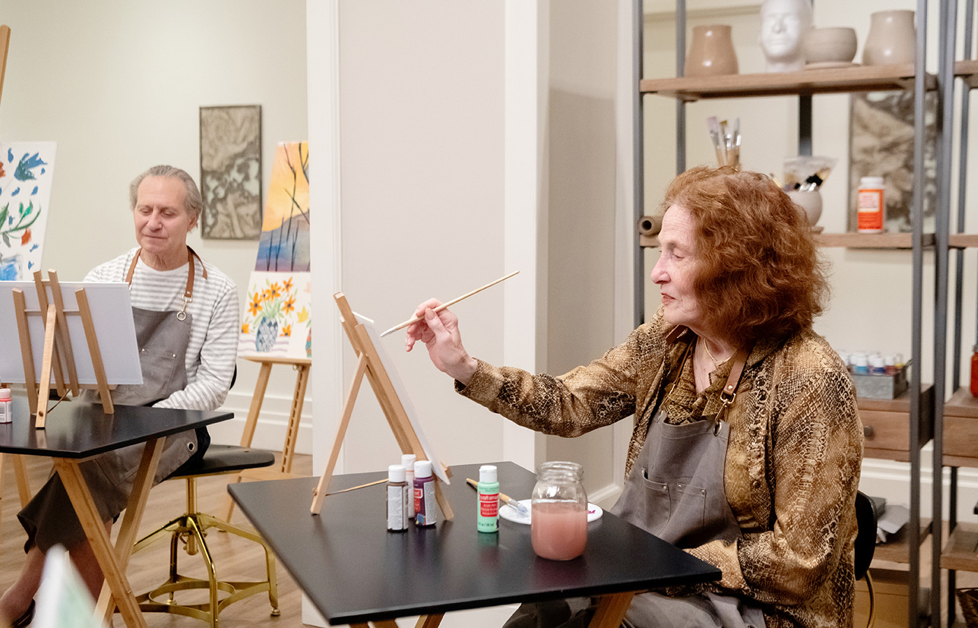 A resident enjoying an art class.