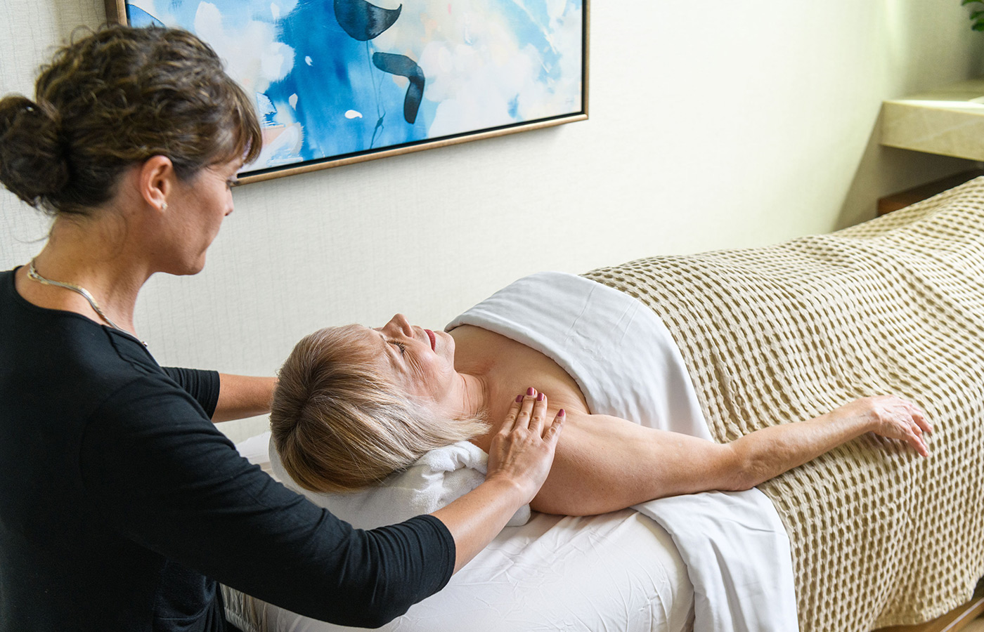 A resident is having a massage in spa 