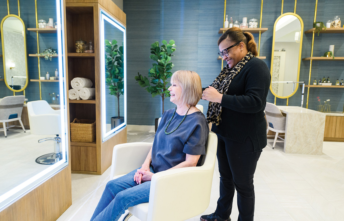 A person getting their hair styled.