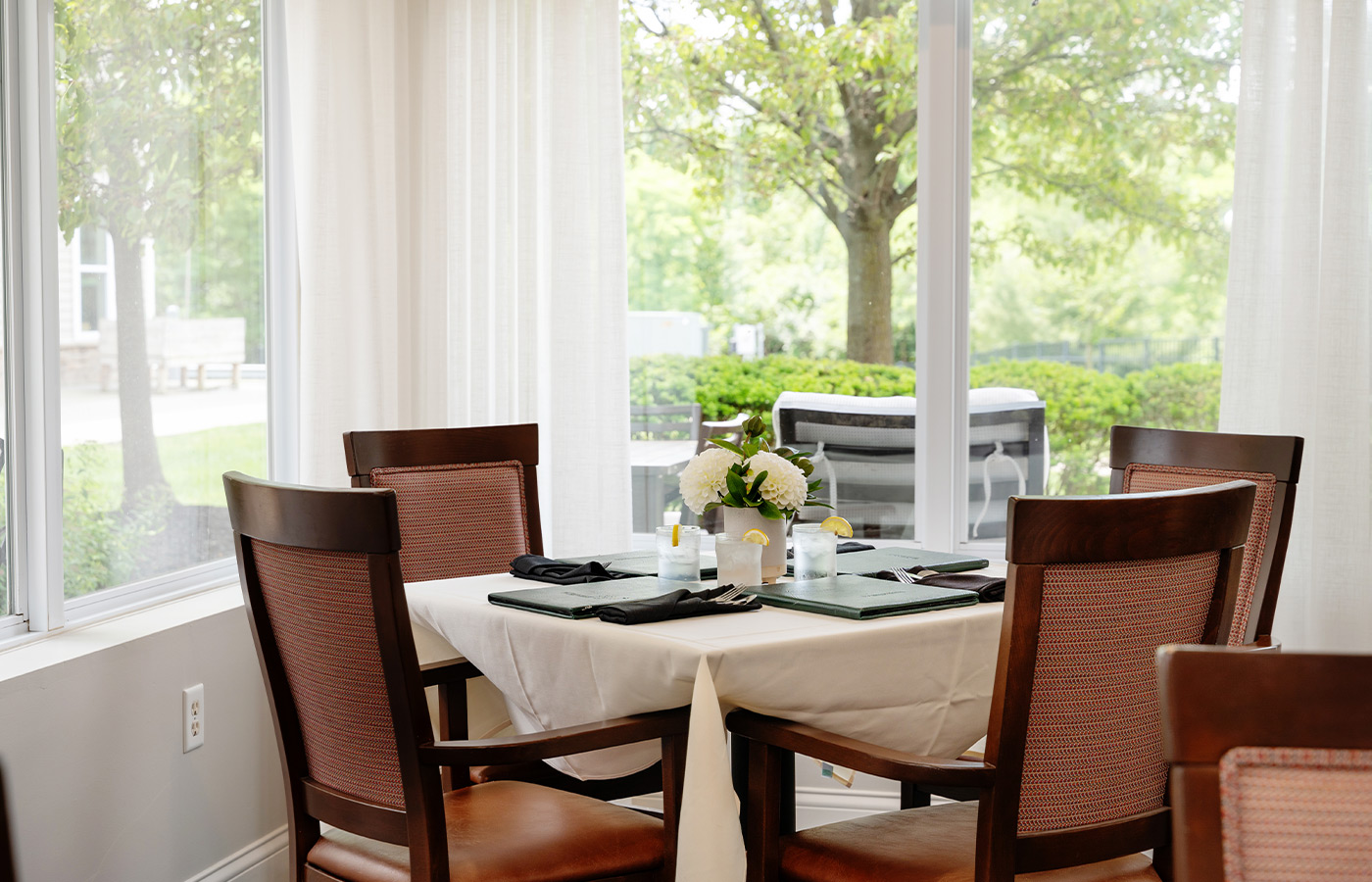 A dining room set for service.