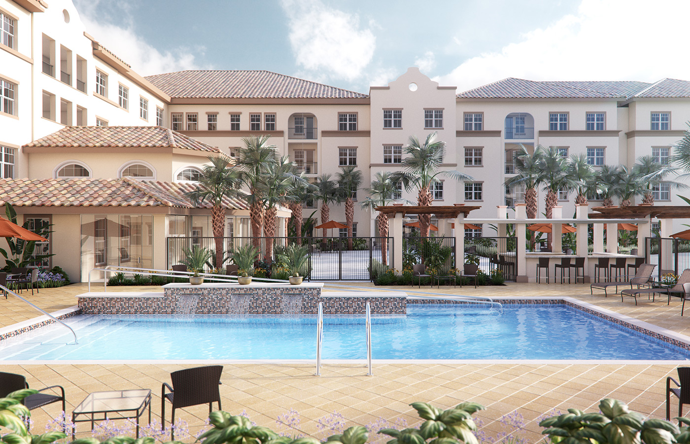 A pool with lounge furniture on the side.