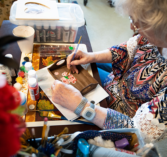 A resident is painting.