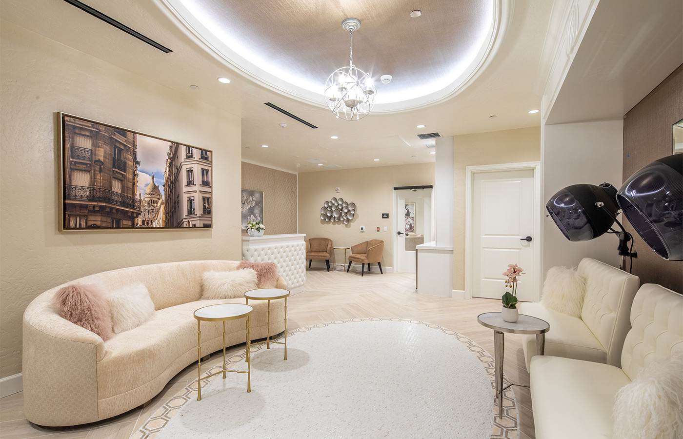 A salon with seating and hair dryers.