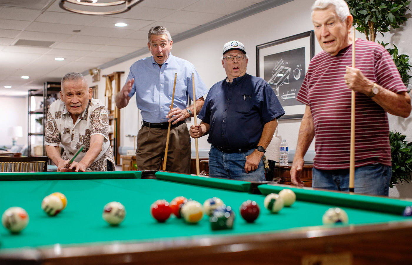 People playing pool.