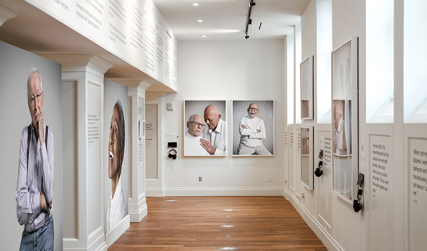 Exhibit showing large photos form the Not Another Second show.