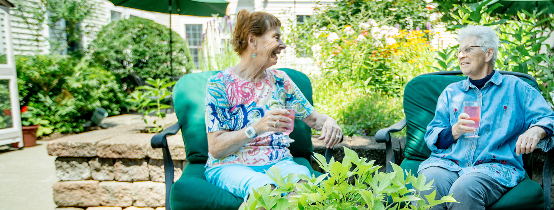 Residents having lunch with a drink.