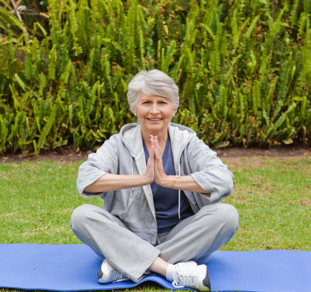 A resident is doing yoga.