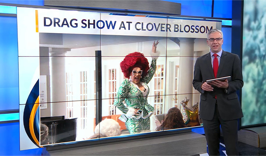 A news broadcast with a drag queen.