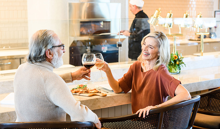 People drinking wine.