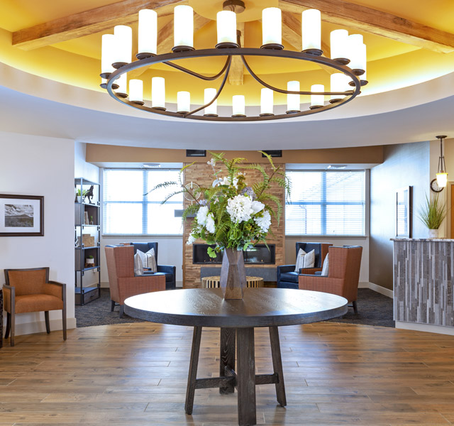 St. Andrew's Village hall with beautiful chandelier and hardwood floors.